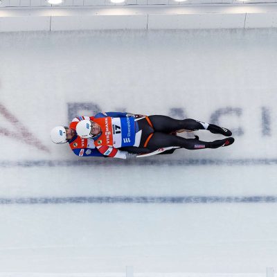 Luge racer sliding down the track at Mt Van Hoevenberg.